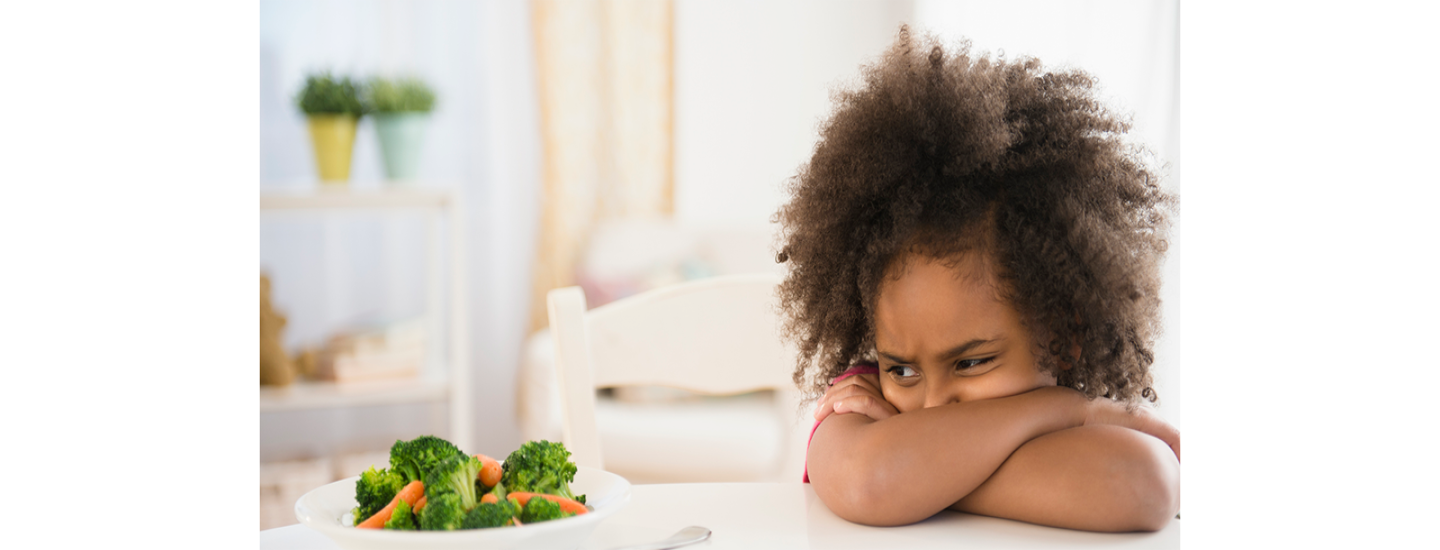 A child refusing eating vegetables