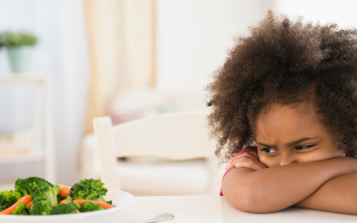 A child refusing eating vegetables